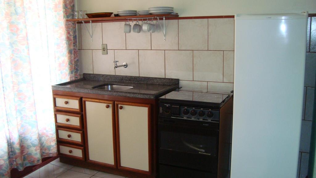 ホテル Residencial Ilha Dourada ゴヴェルナドール・セウソ・ラーモス エクステリア 写真