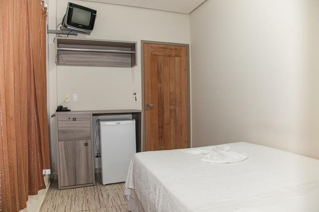 ホテル Residencial Ilha Dourada ゴヴェルナドール・セウソ・ラーモス 部屋 写真