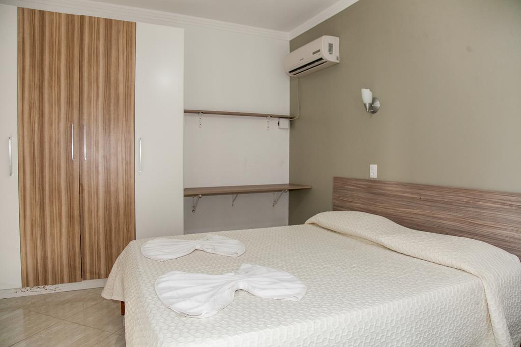ホテル Residencial Ilha Dourada ゴヴェルナドール・セウソ・ラーモス 部屋 写真